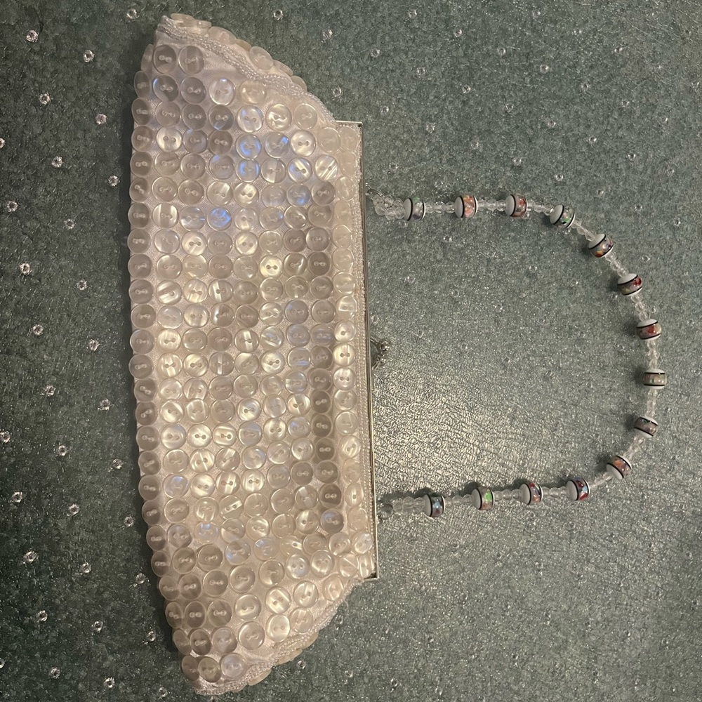 Classy clasp purse with beaded strap
